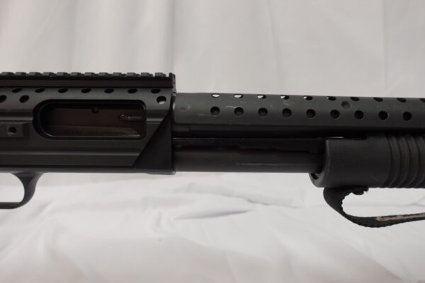 dsc03316__32186.jpg Mossberg 590 Shockwave SPX 12 Ga 12/14.3" Picatanny Rail/Heat Shield; 2 grips. 50648